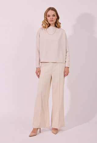 Eleganckie spodnie wide leg w kolorze ecru z ozdobnymi guzikami