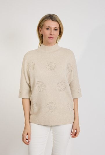 Beżowy sweter damski z haftem kwiatowym