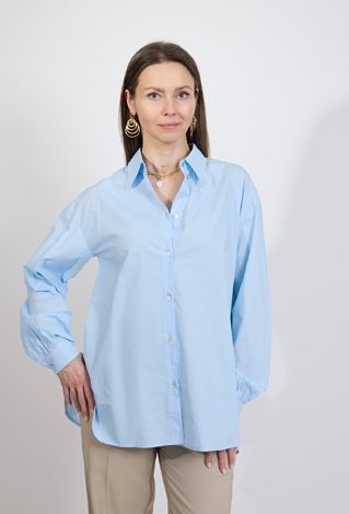 Błękitna koszula damska – elegancka klasyka